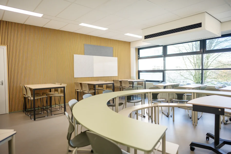 Carousel Table half-ring configuration with paired desks for group work